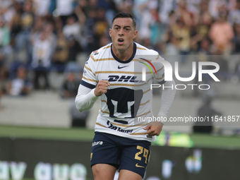 Rogelio Funes Mori #29 of Pumas celebrates after scoring a goal during Matchday 6 against Tigres as part of the Torneo de Apertura 2024 Liga...