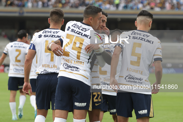 Rogelio Funes Mori #29 of Pumas celebrates after scoring a goal during Matchday 6 against Tigres as part of the Torneo de Apertura 2024 Liga...