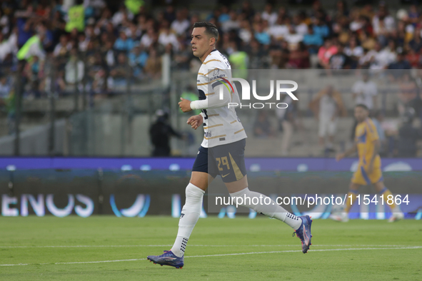 Rogelio Funes Mori #29 of Pumas celebrates after scoring a goal during Matchday 6 against Tigres as part of the Torneo de Apertura 2024 Liga...