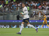 Rogelio Funes Mori #29 of Pumas celebrates after scoring a goal during Matchday 6 against Tigres as part of the Torneo de Apertura 2024 Liga...