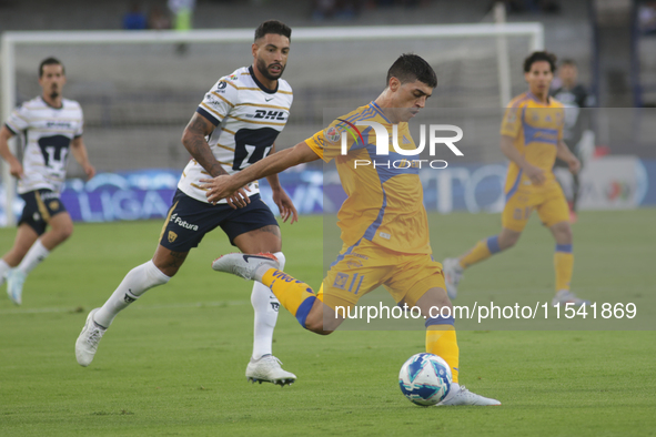 Juan Brunetta #11 of Tigres shoots the ball during Matchday 6 against Pumas as part of the Torneo de Apertura 2024 Liga MX at Estadio Olimpi...