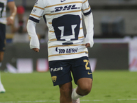 Piero Quispe #27 of Pumas controls the ball during Matchday 6 against Tigres as part of the Torneo de Apertura 2024 Liga MX at Estadio Olimp...