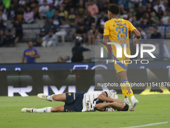 Ruben Duarte #5 of Pumas receives a foul by Jonathan Herrera #29 of Tigres during Matchday 6 as part of the Torneo de Apertura 2024 Liga MX...