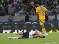 Ruben Duarte #5 of Pumas receives a foul by Jonathan Herrera #29 of Tigres during Matchday 6 as part of the Torneo de Apertura 2024 Liga MX...