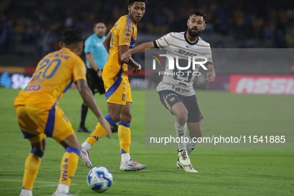 Ruben Duarte #5 of Pumas goes to the ball during Matchday 6 against Tigres as part of the Torneo de Apertura 2024 Liga MX at Estadio Olimpic...