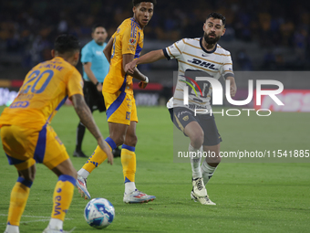 Ruben Duarte #5 of Pumas goes to the ball during Matchday 6 against Tigres as part of the Torneo de Apertura 2024 Liga MX at Estadio Olimpic...