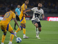 Ruben Duarte #5 of Pumas goes to the ball during Matchday 6 against Tigres as part of the Torneo de Apertura 2024 Liga MX at Estadio Olimpic...