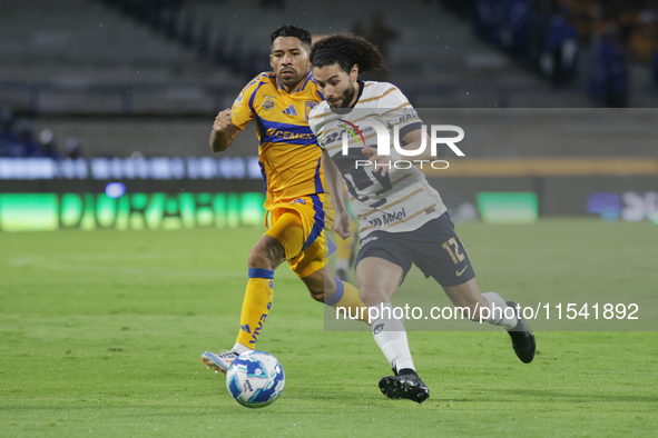 Cesar Huerta #12 of Pumas drives the ball during Matchday 6 against Tigres as part of the Torneo de Apertura 2024 Liga MX at Estadio Olimpic...