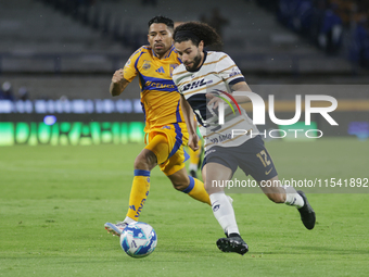 Cesar Huerta #12 of Pumas drives the ball during Matchday 6 against Tigres as part of the Torneo de Apertura 2024 Liga MX at Estadio Olimpic...