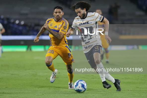 Cesar Huerta #12 of Pumas drives the ball during Matchday 6 against Tigres as part of the Torneo de Apertura 2024 Liga MX at Estadio Olimpic...