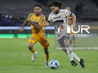 Cesar Huerta #12 of Pumas drives the ball during Matchday 6 against Tigres as part of the Torneo de Apertura 2024 Liga MX at Estadio Olimpic...