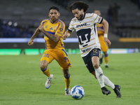 Cesar Huerta #12 of Pumas drives the ball during Matchday 6 against Tigres as part of the Torneo de Apertura 2024 Liga MX at Estadio Olimpic...