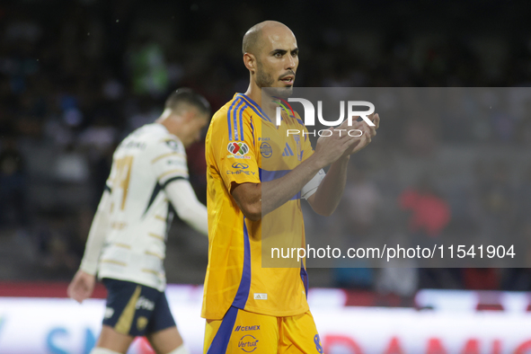 Guido Pizarro #19 of Tigres applauds during Matchday 6 against Pumas as part of the Torneo de Apertura 2024 Liga MX at Estadio Olimpico Univ...