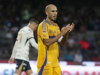 Guido Pizarro #19 of Tigres applauds during Matchday 6 against Pumas as part of the Torneo de Apertura 2024 Liga MX at Estadio Olimpico Univ...