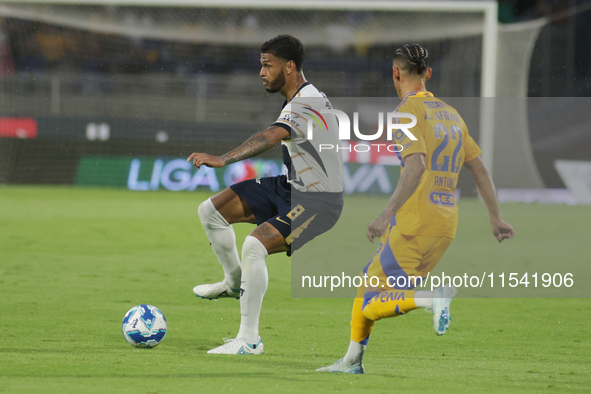 Jose Caicedo #8 of Pumas is marked by Uriel Antuna #22 of Tigres during Matchday 6 as part of the Torneo de Apertura 2024 Liga MX at Estadio...