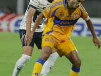 Guido Pizarro #19 of Tigres controls the ball during Matchday 6 against Pumas as part of the Torneo de Apertura 2024 Liga MX at Estadio Olim...