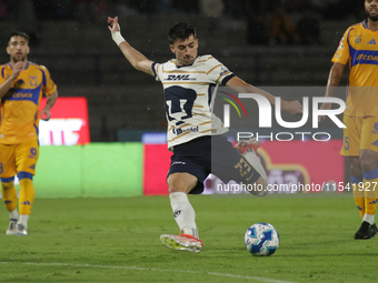 Ignacio Pussetto #23 of Pumas shoots the ball during Matchday 6 against Tigres as part of the Torneo de Apertura 2024 Liga MX at Estadio Oli...