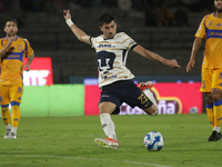 Ignacio Pussetto #23 of Pumas shoots the ball during Matchday 6 against Tigres as part of the Torneo de Apertura 2024 Liga MX at Estadio Oli...