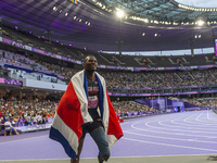 Sherman Isidro Guity Guity of Costa Rica reacts after winning the gold medal in the Men's 100m - T64 Final at Stade de France during the Par...