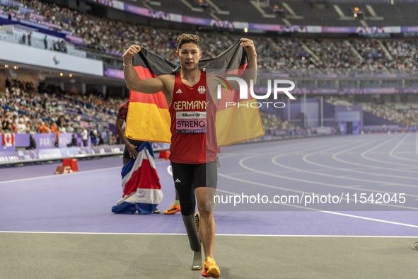 Felix Streng of Germany reacts after winning the bronze medal in the Men's 100m - T64 Final at Stade de France during the Paris 2024 Paralym...