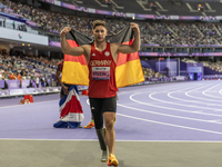 Felix Streng of Germany reacts after winning the bronze medal in the Men's 100m - T64 Final at Stade de France during the Paris 2024 Paralym...