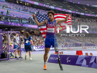 Ezra Frech of the United States of America reacts after winning the gold medal during the Men's 100m - T63 Final at Stade de France during t...