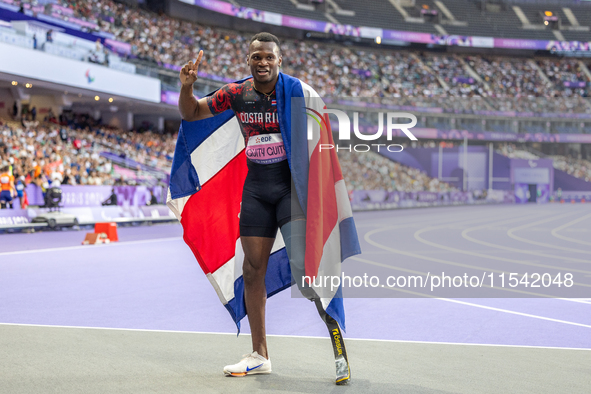 Sherman Isidro Guity Guity of Costa Rica reacts after winning the gold medal in the Men's 100m - T64 Final at Stade de France during the Par...