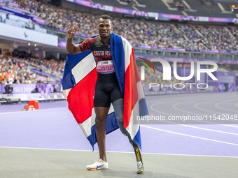 Sherman Isidro Guity Guity of Costa Rica reacts after winning the gold medal in the Men's 100m - T64 Final at Stade de France during the Par...