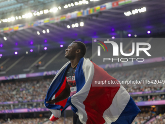 Sherman Isidro Guity Guity of Costa Rica reacts after winning the gold medal in the Men's 100m - T64 Final at Stade de France during the Par...