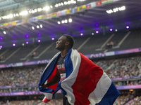 Sherman Isidro Guity Guity of Costa Rica reacts after winning the gold medal in the Men's 100m - T64 Final at Stade de France during the Par...