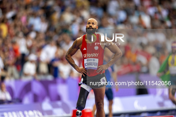 Leon Schaefer of South Africa reacts after the Men's 100m - T63 Final at Stade de France during the Paris 2024 Paralympic Games in Paris, Fr...