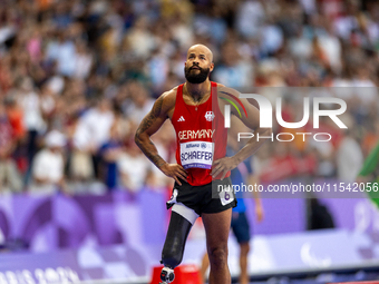 Leon Schaefer of South Africa reacts after the Men's 100m - T63 Final at Stade de France during the Paris 2024 Paralympic Games in Paris, Fr...