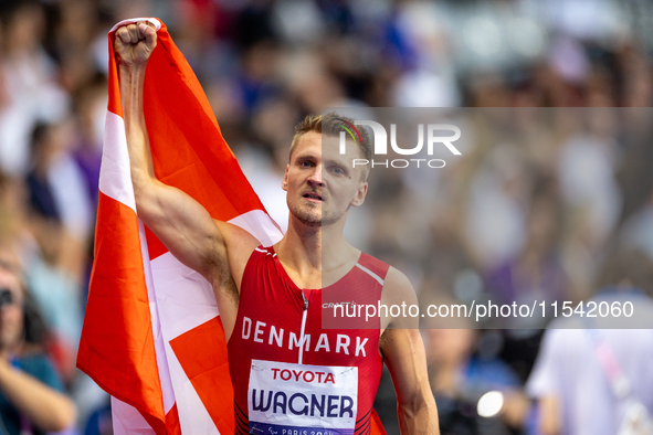 Daniel Wagner of Denmark reacts after winning the silver medal in the Men's 100m - T63 Final at Stade de France during the Paris 2024 Paraly...