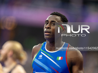 Maxcel Amo Manu of Italy reacts after winning the silver medal in the Men's 100m - T64 Final at Stade de France during the Paris 2024 Paraly...