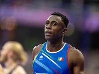 Maxcel Amo Manu of Italy reacts after winning the silver medal in the Men's 100m - T64 Final at Stade de France during the Paris 2024 Paraly...