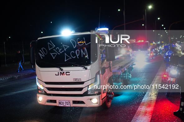 Truckers take part in a demonstration against the rise of fuel prices in Bogota, Colombia, on September 2, 2024. 