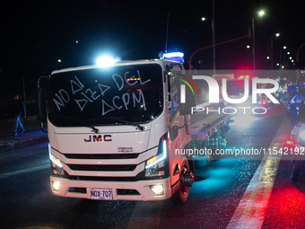 Truckers take part in a demonstration against the rise of fuel prices in Bogota, Colombia, on September 2, 2024. (