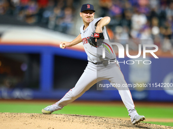 Boston Red Sox pitcher Josh Winckowski #25 throws during the sixth inning of the baseball game against the New York Mets at Citi Field in Co...