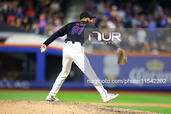 New York Mets relief pitcher Danny Young #81 throws during the eighth inning of the baseball game against the Boston Red Sox at Citi Field i...