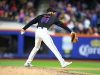 New York Mets relief pitcher Danny Young #81 throws during the eighth inning of the baseball game against the Boston Red Sox at Citi Field i...