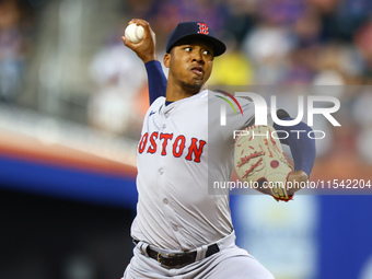 Boston Red Sox pitcher Brayan Bello #66 throws during the second inning of the baseball game against the New York Mets at Citi Field in Coro...