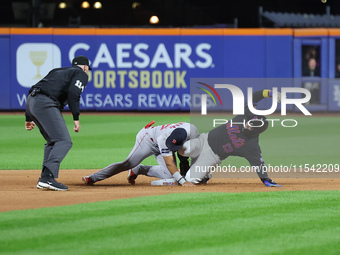 Luis Torrens #13 of the New York Mets doubles during the seventh inning of the baseball game against the Boston Red Sox at Citi Field in Cor...