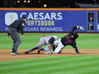 Luis Torrens #13 of the New York Mets doubles during the seventh inning of the baseball game against the Boston Red Sox at Citi Field in Cor...