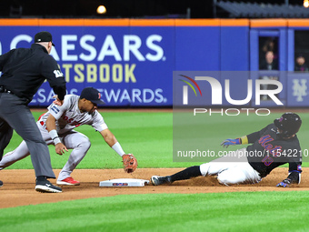 Luis Torrens #13 of the New York Mets doubles during the seventh inning of the baseball game against the Boston Red Sox at Citi Field in Cor...