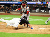 New York Mets DJ Stewart #29 scores from 2B during the fourth inning of the baseball game against the Boston Red Sox at Citi Field in Corona...