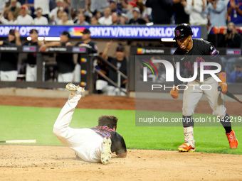 New York Mets DJ Stewart #29 scores from 2B during the fourth inning of the baseball game against the Boston Red Sox at Citi Field in Corona...