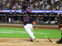 New York Mets DJ Stewart #29 singles during the fourth inning of the baseball game against the Boston Red Sox at Citi Field in Corona, N.Y.,...