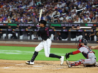 Brandon Nimmo #9 of the New York Mets doubles during the third inning of the baseball game against the Boston Red Sox at Citi Field in Coron...