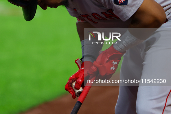 Enmanuel Valdez #47 of the Boston Red Sox prepares his bat while on deck during the second inning of the baseball game against the New York...