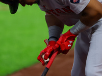 Enmanuel Valdez #47 of the Boston Red Sox prepares his bat while on deck during the second inning of the baseball game against the New York...